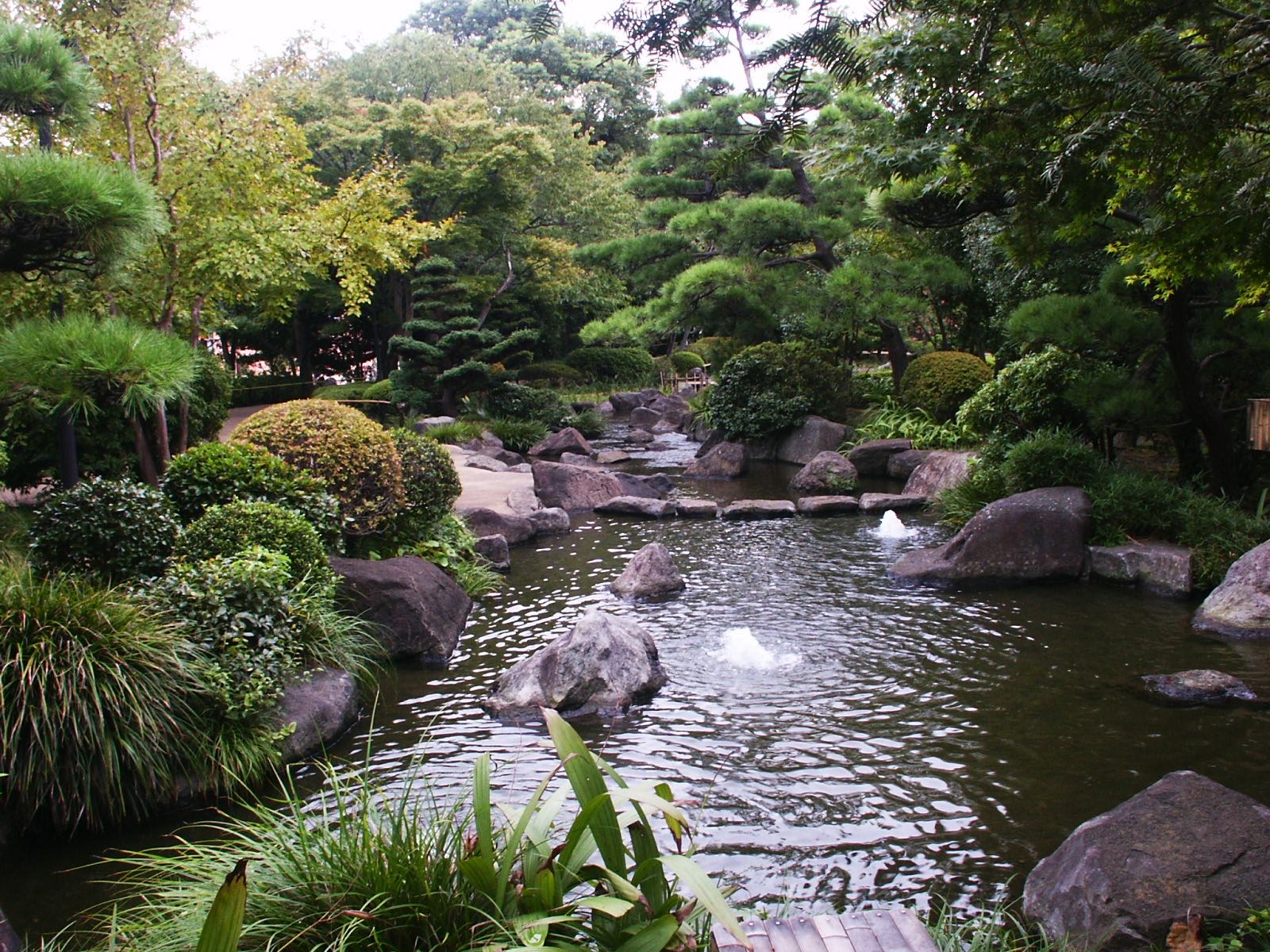 Water feature in a Balinese garden design by Imperial Gardens